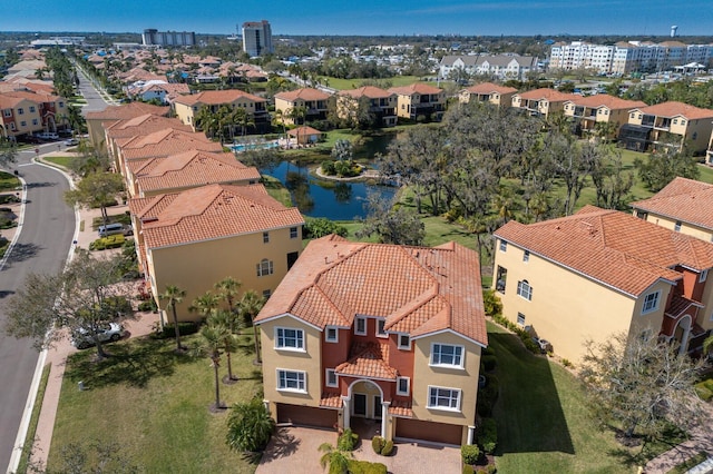 aerial view with a water view and a residential view