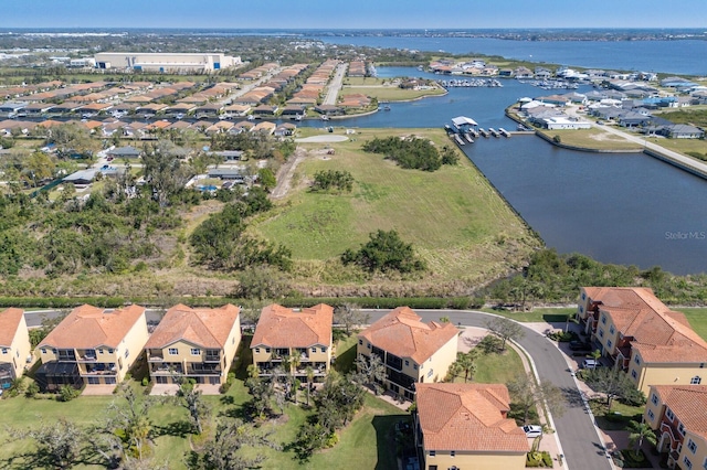 aerial view featuring a water view and a residential view