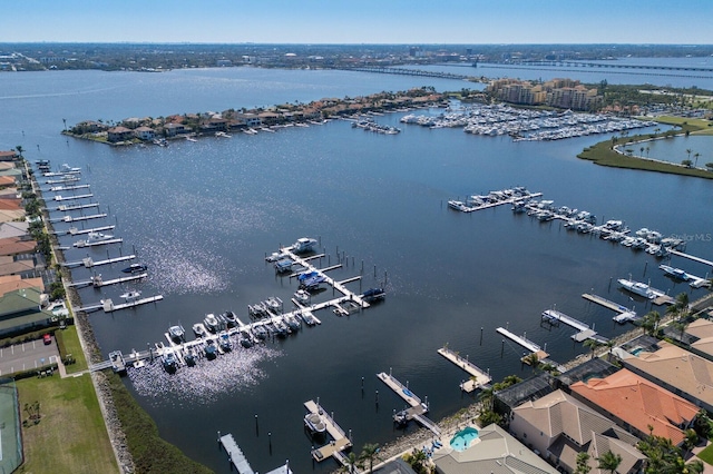 birds eye view of property featuring a water view