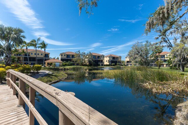 1318 3rd Street Cir E, Palmetto, FL 34221 - dock area featuring a water view and a residential view
