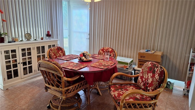 dining space featuring tile patterned flooring