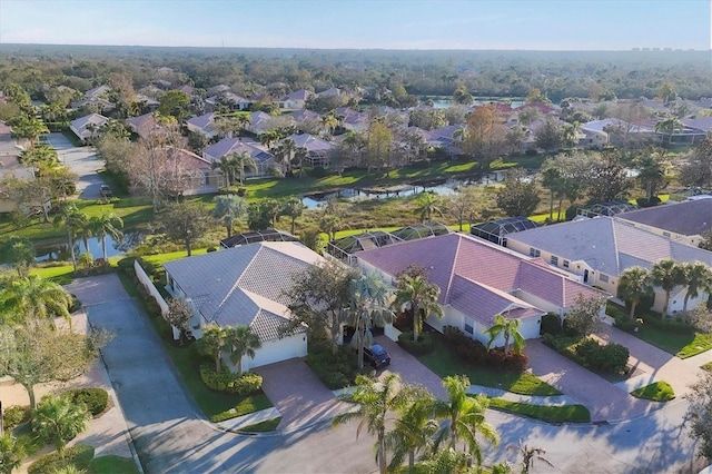 aerial view with a water view and a residential view