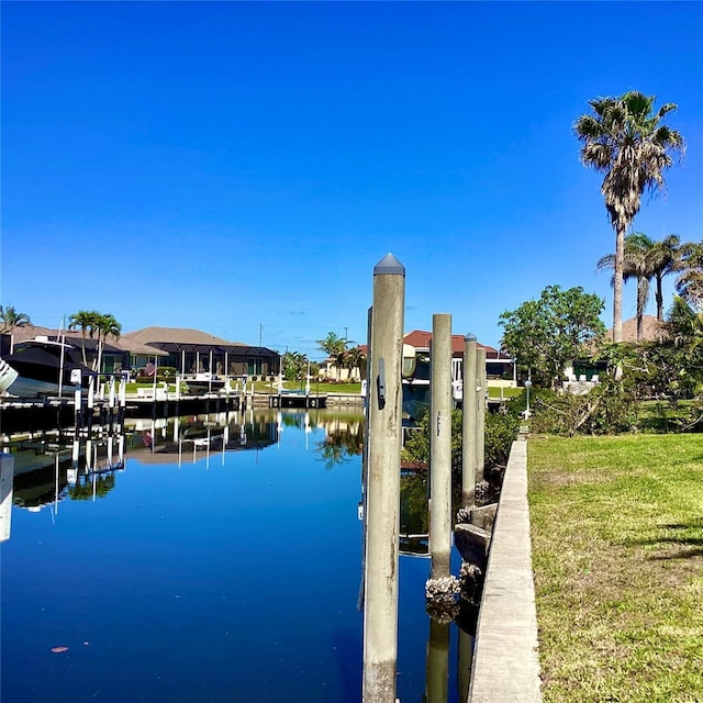 1428 Pine Island Ct, Punta Gorda, FL 33950 - view of dock with a water view and a yard