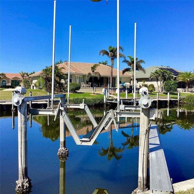 1428 Pine Island Ct, Punta Gorda, FL 33950 - dock area with a water view and boat lift