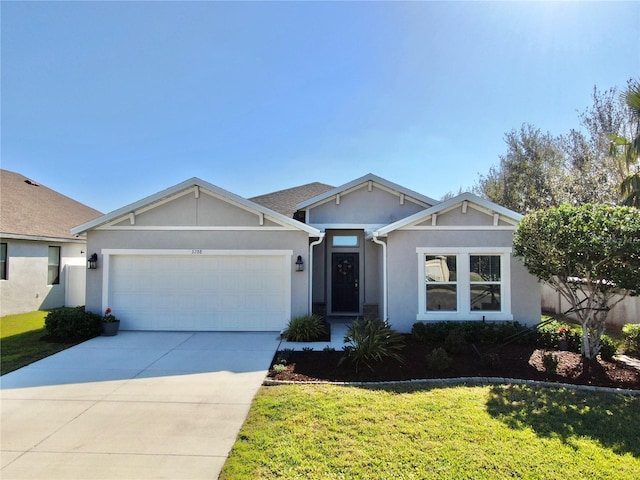 ranch-style house featuring stucco siding, driveway, a front yard, and an attached garage