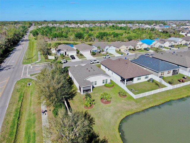 aerial view with a residential view and a water view