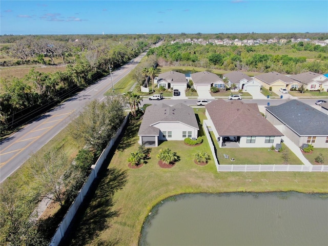 aerial view with a residential view and a water view