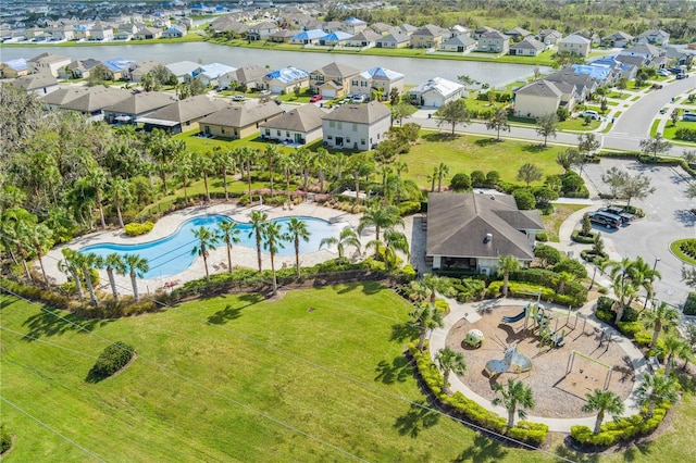 birds eye view of property with a residential view