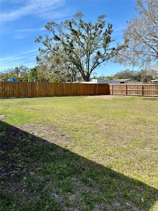 view of yard featuring fence