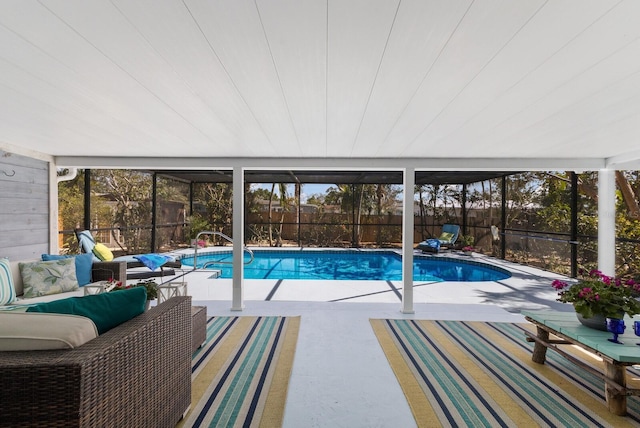 view of swimming pool featuring a fenced in pool, a patio area, a fenced backyard, and an outdoor hangout area