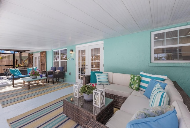 view of patio with french doors and an outdoor living space