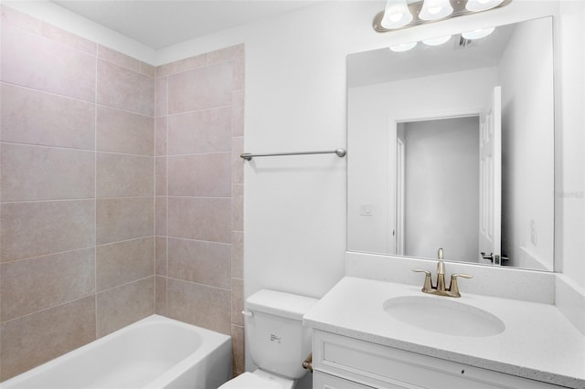 bathroom featuring vanity, toilet, and shower / bathtub combination