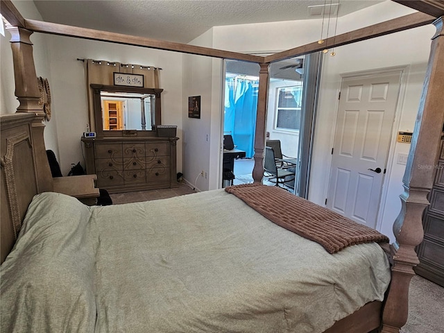 carpeted bedroom featuring baseboards, access to outside, decorative columns, and a textured ceiling