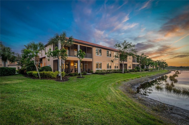 view of property with a water view