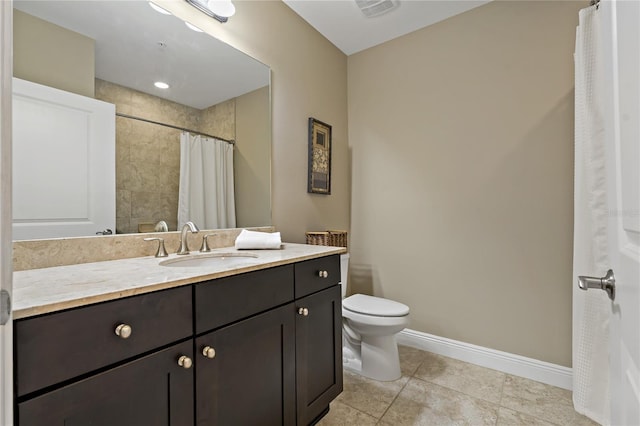 full bath featuring visible vents, toilet, vanity, baseboards, and tile patterned floors