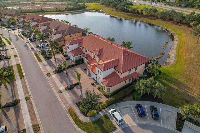 aerial view featuring a water view and a residential view