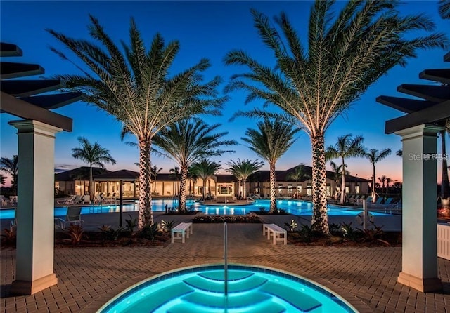 pool with a patio area