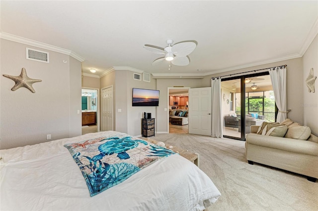 carpeted bedroom with access to exterior, visible vents, ornamental molding, and ensuite bathroom