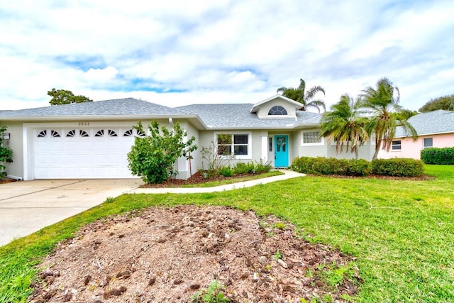 single story home featuring an attached garage, driveway, a front lawn, and stucco siding