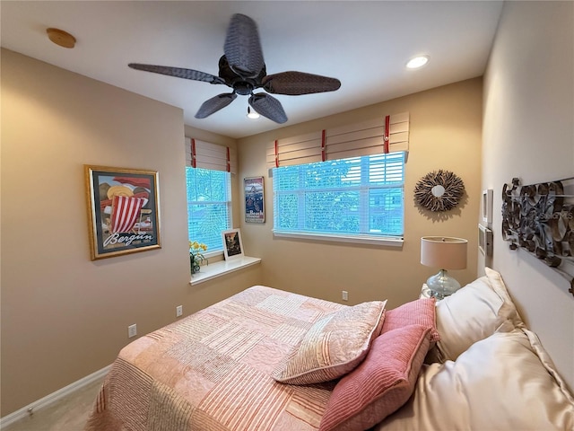 carpeted bedroom with a ceiling fan, recessed lighting, and baseboards