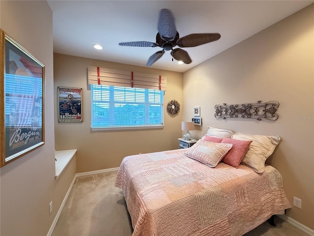 bedroom featuring recessed lighting, baseboards, a ceiling fan, and light colored carpet