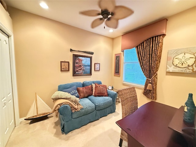 living room featuring ceiling fan, carpet floors, and recessed lighting