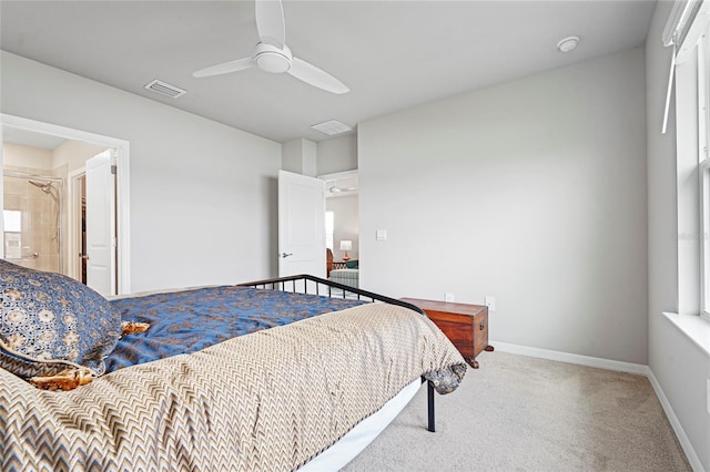 carpeted bedroom with baseboards, visible vents, and a ceiling fan