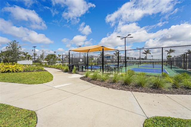 view of property's community with fence