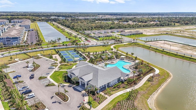 birds eye view of property featuring a water view