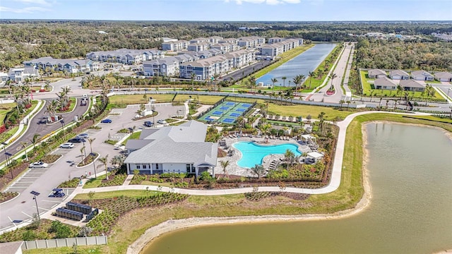 aerial view featuring a water view and a residential view