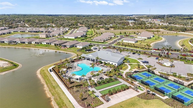 aerial view with a residential view and a water view