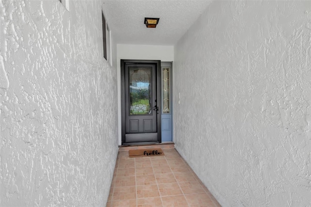 property entrance featuring stucco siding