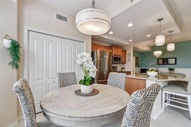 dining space featuring recessed lighting, visible vents, and light tile patterned flooring