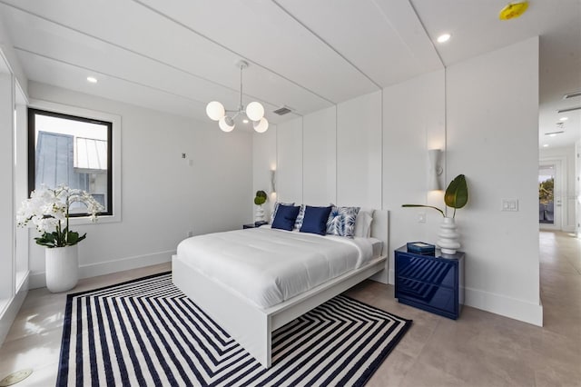 bedroom with a notable chandelier, multiple windows, visible vents, and baseboards