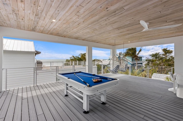 wooden terrace featuring ceiling fan