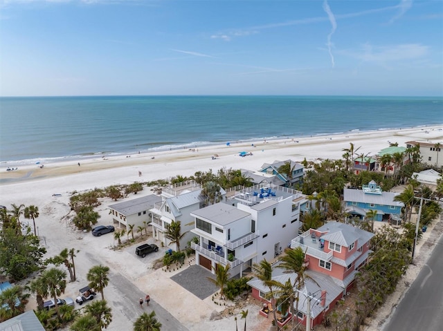 aerial view featuring a water view and a view of the beach