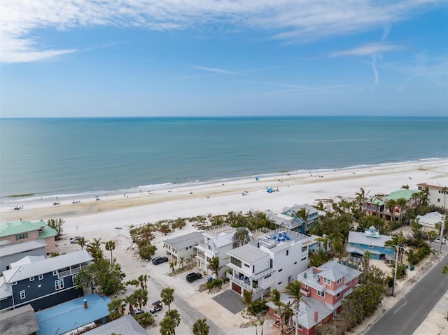 bird's eye view with a view of the beach and a water view