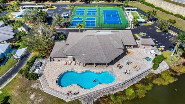 birds eye view of property featuring a water view