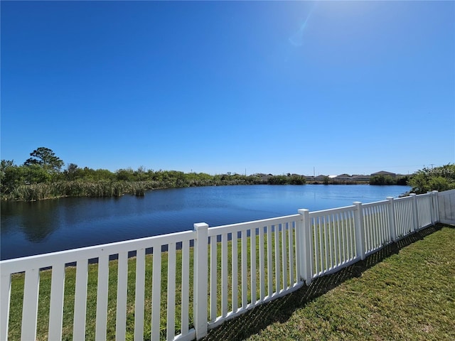 view of water feature with fence