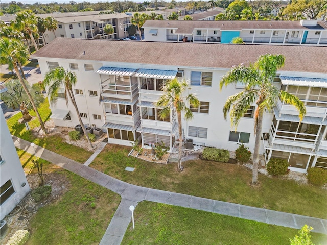 birds eye view of property with a residential view
