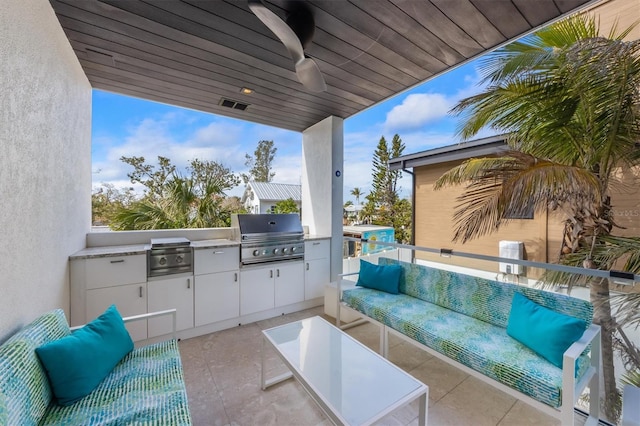 view of patio with an outdoor hangout area, area for grilling, visible vents, a ceiling fan, and grilling area