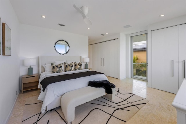 bedroom featuring ceiling fan, recessed lighting, visible vents, baseboards, and multiple closets