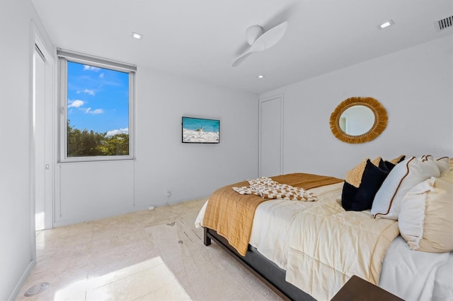 bedroom with a ceiling fan and visible vents