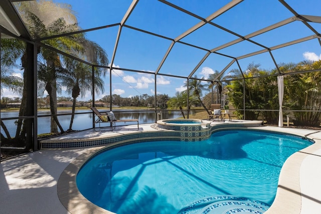 view of pool with a pool with connected hot tub, a lanai, a water view, and a patio