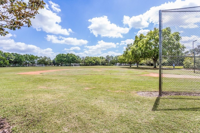 surrounding community featuring a yard