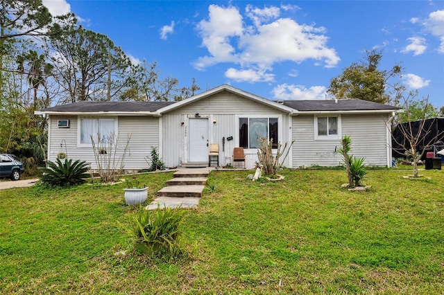 ranch-style house with a front lawn