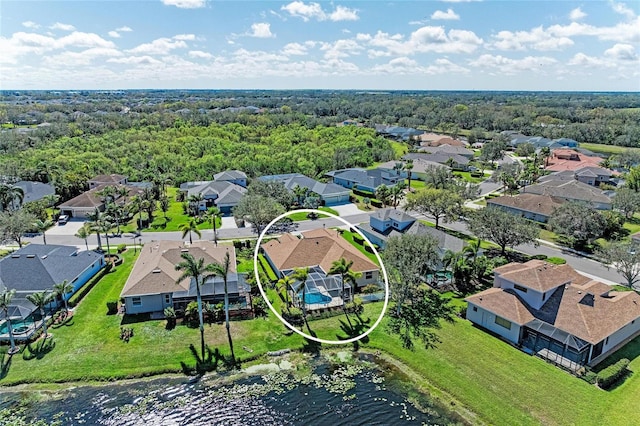 birds eye view of property with a residential view