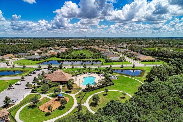 bird's eye view featuring a water view and a residential view