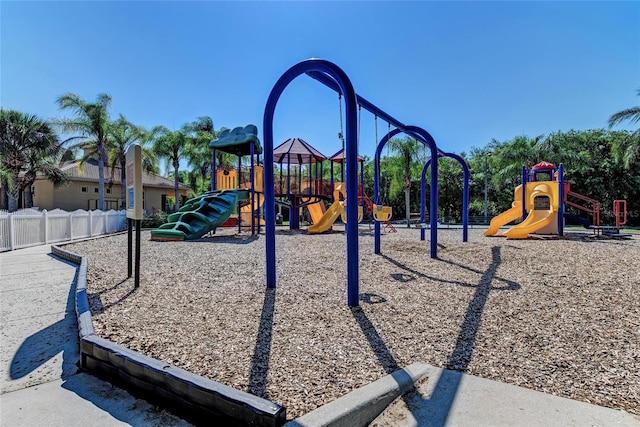 community jungle gym with fence