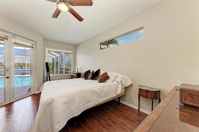 bedroom with ceiling fan, access to outside, hardwood / wood-style floors, and baseboards